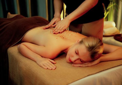 woman-customer-having-exfoliation-treatment-luxury-spa-quiescent_31965-363513